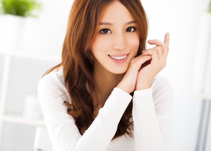 asian woman in white blouse