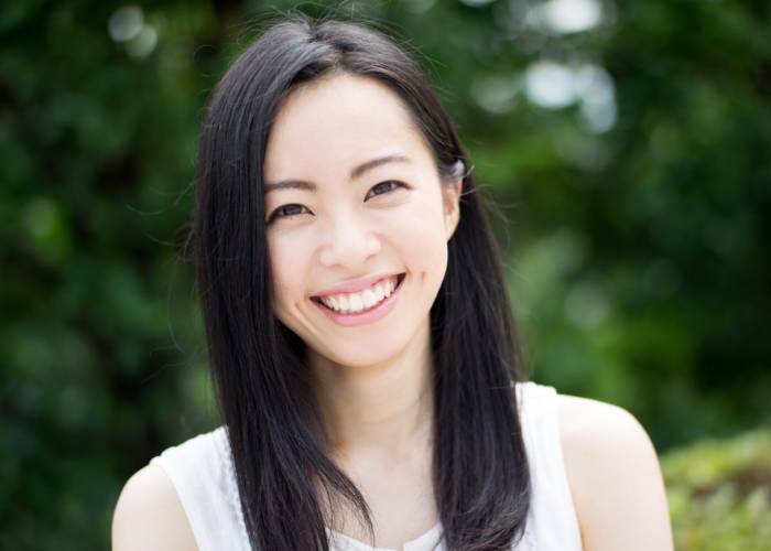 Asian woman smiling