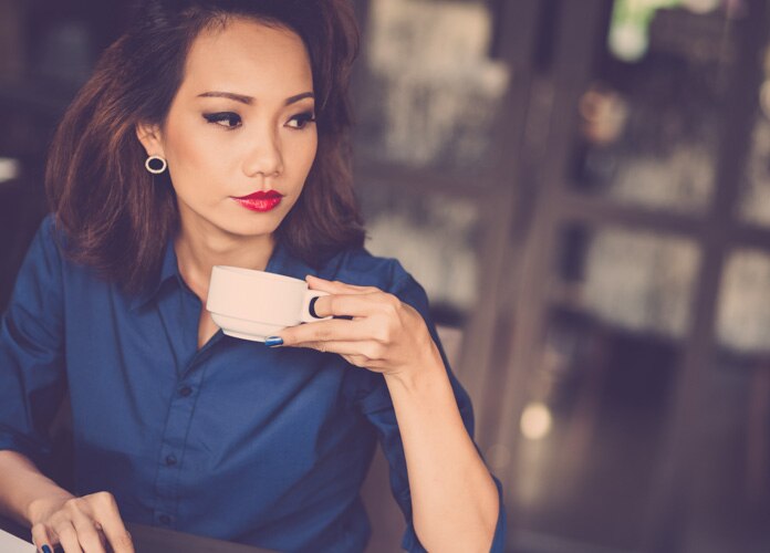 woman with cup of coffee